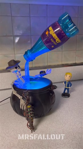 Mrs.Fallout👩‍🔧 on Instagram: "Transforming a Halloween decoration Fallout! I’ve seen various forms of this fountain being sold both online and in stores this Halloween. I grabbed one cheap off Amazon to make it Fallout. The glass Nuka bottles are too heavy for this so I used one of the plastic ones. I had to remake the tube because the one that came with this was green. I used a regular plastic straw and a heat gun to make the tube wide enough to fit the pump and then also for the bend that he
