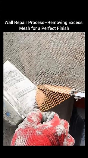Wall Repair Process – Removing Excess Mesh for a Perfect Finish.