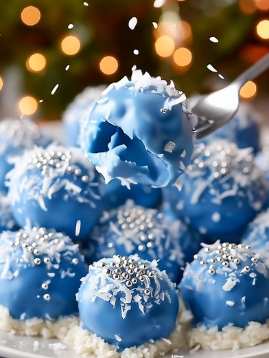 Winter Wonderland Truffles Dreamy blue chocolate truffles coated in coconut snow — a magical bite of winter bliss. Yield: 20 truffles | Chill Time: 1 hour | Temp: No-bake Key Ingredients First: White chocolate Cream cheese ................................. Full Recipe in First Cօʍʍеոτ 👇 | Slice of Heaven
