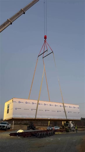 ⭐️A few months ago, we shared a look at the modular housing process behind our Bond Portfolio projects. This week, that process is officially on site! This video shows a Volumod unit being lifted off the truck and placed onto the foundation at Grayson Village, the prototype for our Bond Portfolio, marking an exciting milestone! Below is the link to that previous post: https://www.facebook.com/share/v/1D8gutpaZ4/ | REB Architects