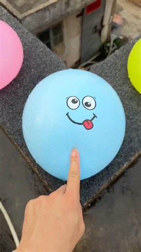 Experiment Will a water balloon explode if it rolls down a tall building?#balloon #shorts #viral