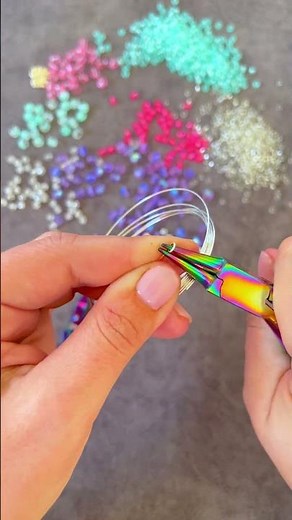 DIY Memory Wire Wrap Bracelet! Link in Description to shop colorful beads and jewelry supplies.