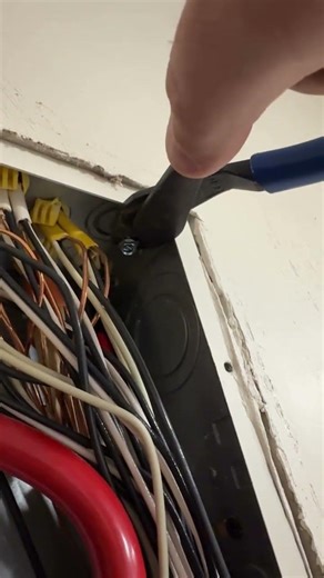 Simple trick for removing a knockout seal in an interior panel. #electrician #electricalboxes