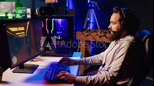 Man upset after losing while playing FPS videogame, using headphones mic to talk with friends. Gamer shutting down computer in anger after receiving game over screen, blaming online teammates