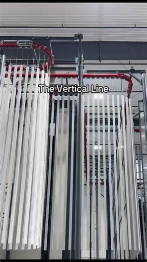 What is a Vertical Powder Coating Line? 👇 It’s more than just a “tall conveyor.” This automated system hangs aluminum profiles vertically, giving a smoother, more even finish while coating thousands of feet per hour. Why it’s different: ✅ Gravity helps the coating flow perfectly ✅ Automated guns ensure consistent thickness ✅ Handles high volume efficiently ✅ Designed for precision and efficiency, every time. If you’re an architect, engineer, or fabricator, this is the machine you want your prof