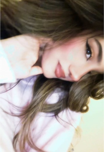 Cozy Indoor Moments: Relaxing in a Fluffy Pink Robe