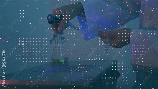 Vertical video: Holding clamp, tech lowering green vial onto scale to weigh in white lab coat