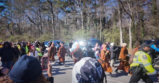 Buddhist monks draw largest crowd yet as peace walk reaches Decatur