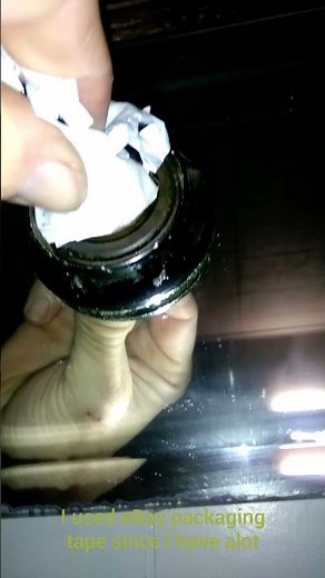 how to remove broken light bulb from socket with ball of tape