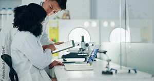 Science, collaboration and technology with a team of doctors working in a laboratory for research or tablet. Healthcare, study or medicine with a man and woman scientist for lab results together