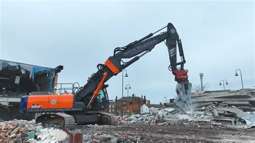 A closer look at a heavy machine working on demolition site