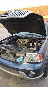 Replacing a Water pump,fan clutch and belt in a Target parking lot on my 2003 Lincoln Navigator 5.4