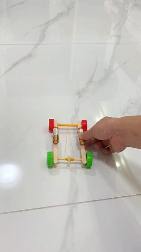 paper crafts creator on Instagram: "You can make a fun car with ice cream sticks and bottle caps, let's make one for your #kids! #parentchildhandwork #handwork #homemade #toys #icecreamstickcraft #diytoys #woodtoys #fun #creativity #reelsfb #reelsvideo #reels paper craft"