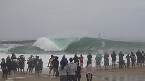 Surfers ride giant waves at The Wedge 🤯 #big #waves #surfing #thewedge #adventure | Beefs TV