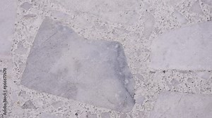 Granite texture background a rugged, timeless canvas that exudes strength and natural elegance. This textured surface, its speckled appearance and deep earthy hues,. High quality 4k footage Stock Video