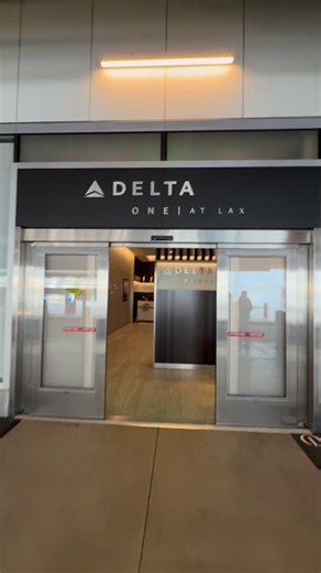 The entrance for Delta One at LAX is in Terminal 3 at Arrivals, not Departures. After that, you walk straight through a private TSA security line. The lounge itself is bright, airy, and filled with natural light. It was definitely busy, but it never felt crowded. There were plenty of empty seats. One of my favorite features? The outdoor terrace overlooking the tarmac. The design throughout the lounge nods to Old Hollywood glamour with colorful art from local LA artists. I also noticed a healthy 