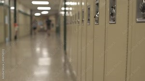 Students walking down hall by lockers