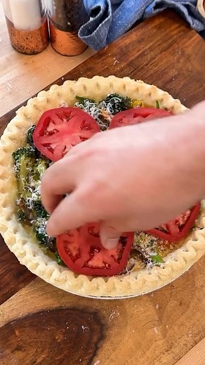 This Loaded Vegetable Quiche is perfect for a weekend brunch, packed with produce, including onions, spinach and mushrooms. The Parmesan does double duty, providing cheesiness as well as saltiness. Get the recipe in the comments ⤵️ | EatingWell