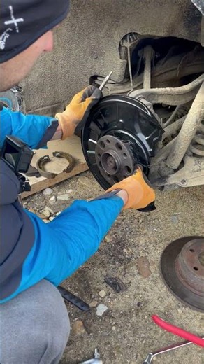 Rear brake disc protection plate installed on Mercedes #tutorial #automobile #mechanic #brake #new