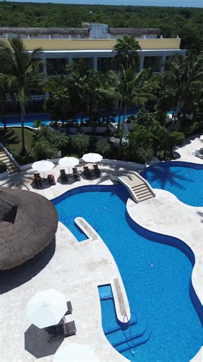 123 reactions · 23 comments | Immerse yourself in serenity at Secrets Aura Cozumel’s pool area, surrounded by lush palms and tropical beauty. Where relaxation flows as naturally as the island breeze. #secretsauracozumel #cozumel #islacozumel #adultsonly #beachvacation | Secrets Aura Cozumel | Facebook