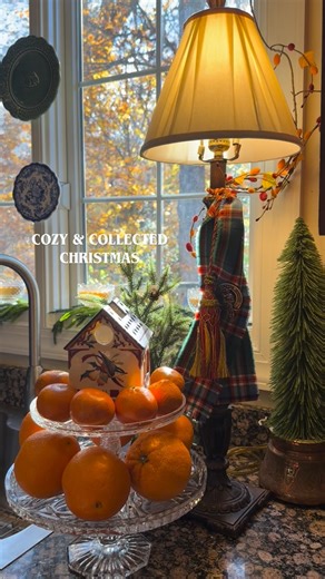 Answering the question about the fabric around my lamp: it’s a Scottish binding, traditionally used in handfasting ceremonies such as weddings. Ours is in MacFarlane Clan hunting tartan. A nod to family heritage. I’ve pinned it with a kilt pin bearing our clan motto. I found the brooch in Scotland, and the handfasting cloth on Etsy. Tartan with a sense of heritage feels at home with most Christmas and home styles, as it blends tradition with collected style. (e.g., Ralph Lauren aesthetic, Englis