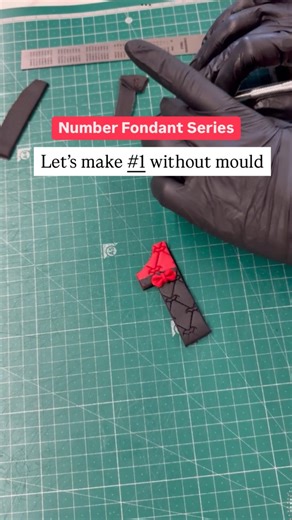 Who knew making a fondant number 1 could be this fun? With the right tools and a little practice, you’ll be shaping and decorating the perfect number 1 in no time- adding a fun, personal touch to any cake #cakereels #fondantcake #number1cake #cakegoals #cakedesıgn #cakedecorating #pinkluciousbaker #fondanttutorials | Pinklucious Baker
