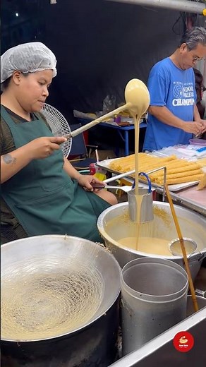 Watch The Art of Crafting Crispy Khanom La, a Traditional Thai Dessert.
