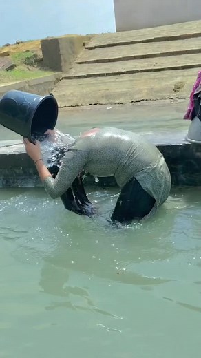 Traditional Communal Bathing Ritual in Nature