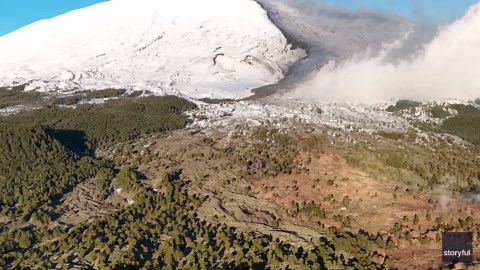 Lava Flows Down Snowy Mount Etna