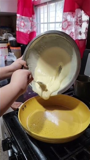 teaching her how to cook