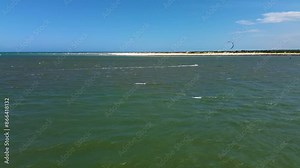 A kite surfer cruising along the St. Augustine inlet in Florida.