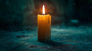 Download waving candle light in dark room, night, motion loop for free