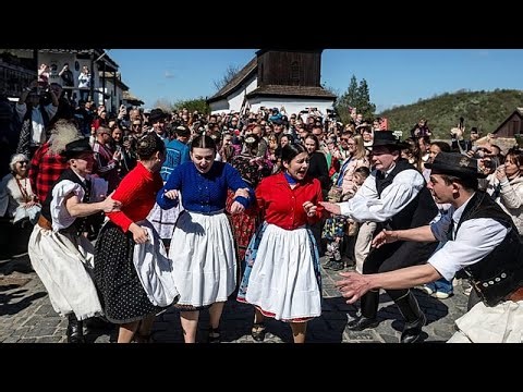 Hungarian Easter tradition sees women doused with water in Hollókő