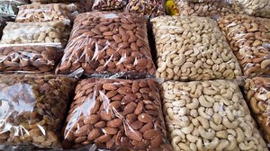 Download Assorted nuts and dried fruits display for free