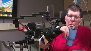 Brain implant lets paralysed man feed himself using his thoughts