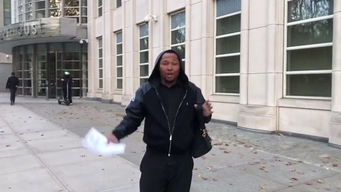 NBA gambling co-defendant Curtis Meeks speaks to reporters as he leaves the courthouse