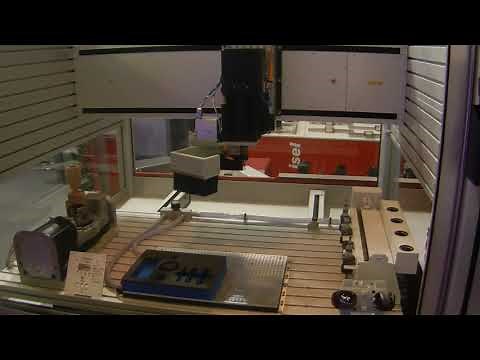 Isel Automation - EuroMod with automatic tool changer and DSH-S dual axis rotary stage