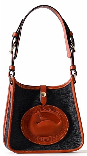 Introducing the Heritage Collection: the duck you know and love, reimagined in new silhouettes. 🦆 | Dooney & Bourke