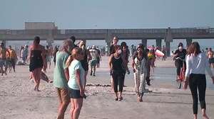 Crowds flock to reopened beaches as Florida hits record coronavirus cases