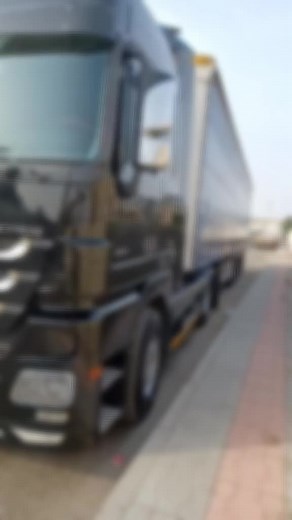 Mercedes-Benz Semi-Truck Showcase on Paved Road