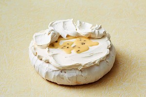 This golden pavlova with a Passiona curd filling will have everyone talking this festive season. Especially when just making one could win you a new barbecue, thanks to Char-Griller Australia. Find the recipe and all the details in the latest issue of taste.com.au mag, out now. #tastemag #tastemagcover | Taste.com.au
