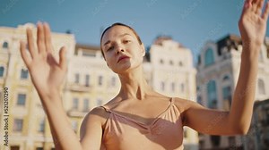 Beautiful ballerina shows graceful dance moves with hands Stock Video