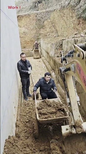 The process of loading soil into a small trolley