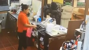 Video: Restaurant customer shoots armed robber through drive-thru window