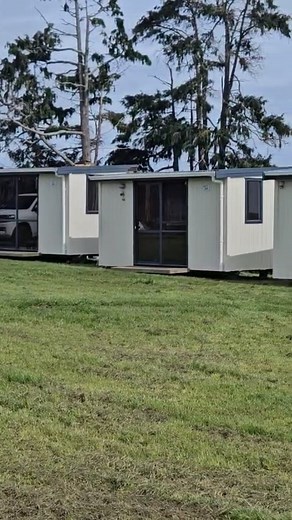 Watch to the end to see who’s watching this rental cabin delivery 😆 | RoomMate Cabins