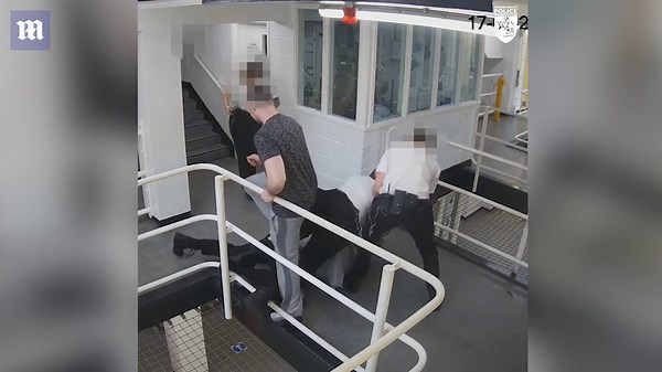 Shocking moment prisoner lunges at prison guard with plastic knife