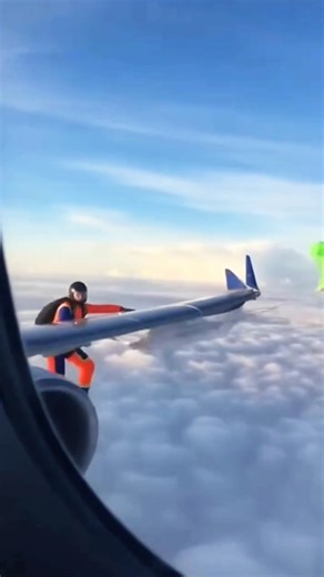 A regular jump turns wild when a plane suddenly passes below.