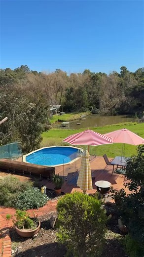 How’s this for a peaceful backyard escape? 🌿 Featuring the Sterns Whitsunday 5.0 x 3.8 x 1.37m oval saltwater above ground pool 💦 In Western Australia, our range of braceless pools only require fencing around the ladder and skimmer box when installed fully above ground, so you can float the day away and still enjoy those beautiful backyard views 😎💦 (fencing is required on any sides where decking is added on). #abovegroundpool #modularpool #diypool #sternspools #saltwaterpool | Poolmaster Poo