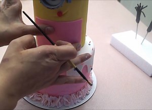 336K views · 3.7K reactions | How to make a 3D minion girl cake By: Sugarella Sweets | MetDaan Cakes | Facebook