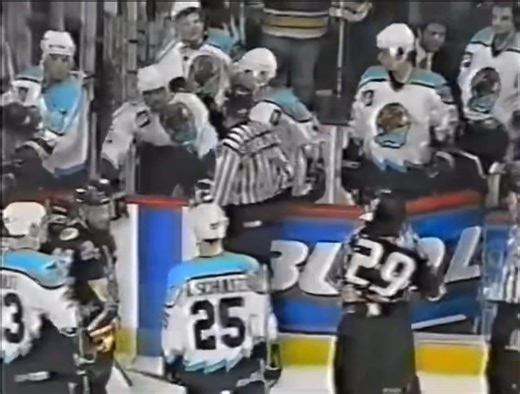 Cleveland’s Garrett Burnett doesn’t need a shift during the game to get his job done, as he’s able to seek out fellow toughie, Chicago’s Chris LiPuma from the comfort of his own bench - IHL action from the Allstate Arena, 2000/01 season 👊 | Drop The Gloves 2.0